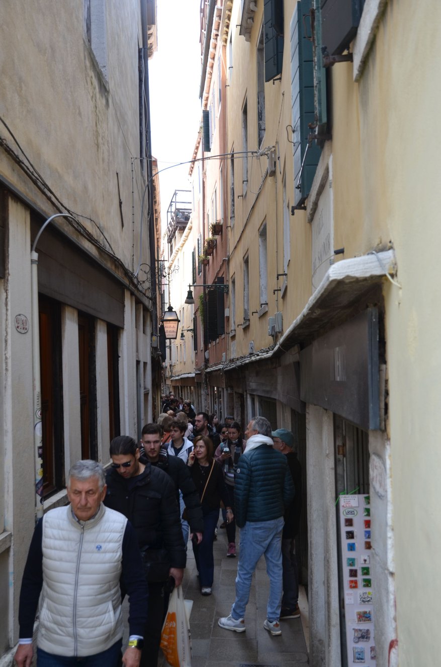 Crowds in narrow alleys