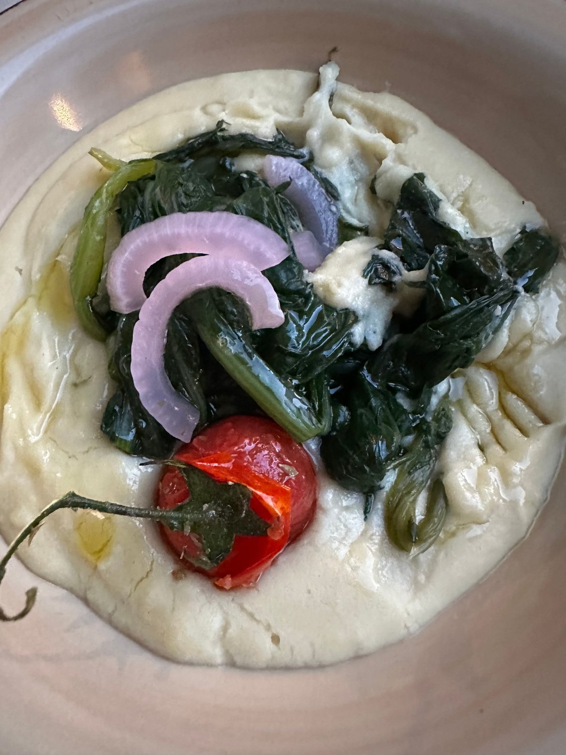 Again, our new favorite dish: Fave e cicorie, plated so prettily here; my partner let me have a minscule taste