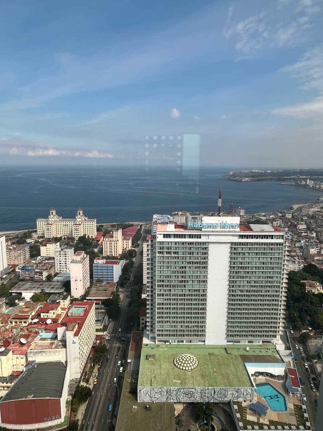 The malecon and National hotel in the background and the Habana Libre hotel in the foreground. 