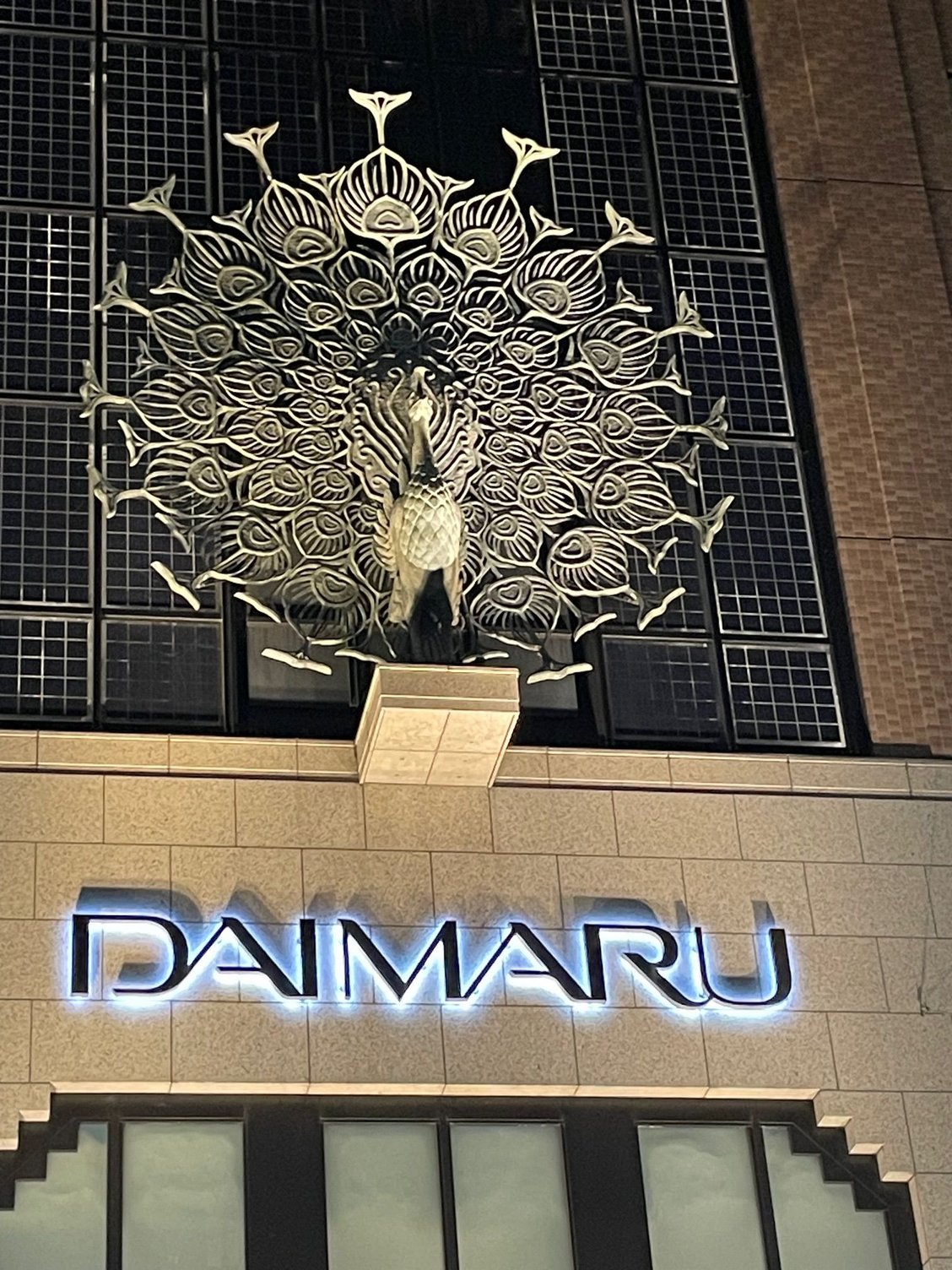 A couple of photos from the walk back home. This is a big department store, Daimaru with a giant peacock on the front entrance