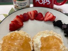 Scones with peach jam and clotted cream