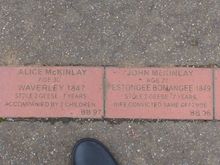 The convict trail, paving stones with personal details along the street