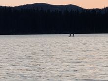 Nathan and Kate paddle boarding.
