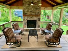 Stereo speakers are on the headers on both sides of the fireplace. Two of the four radiant heaters are on the other headers.
