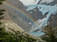 Rainbow over a glacier made lake