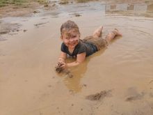 This youngster is on a Station out of Longreach.  They had 83mm 
(about 3 1/2 inches) of rain over the weekend.

Happiness is a little kid playing in the mud!