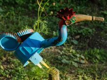 Local artiste Pierre Prevost has created a series of whimsical, painted metal bird-scarecrows that he calls 'zozlos'. 
