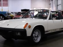 
Looked like this one, but with narrow striping in silver and black 