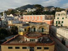 Same pink building with the abovementioned INPS in the foreground. 