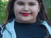 We were near semi-rural via Soranzano. This girl was walking with mom plus their dog, which was a cross between a German shepherd and a mammoth.