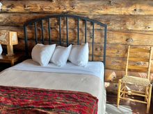 One of the log cabin rooms in the original Old Faithful Inn