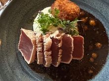 *SEARED RARE TUNA
Cauliflower goat cheese croquette, mashed potatoes, truffled black garlic sweet pepper vinaigrette