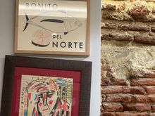 A few of the cornucopia of interesting drawings and photos embellishing the walls