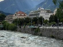The Passer River and mountains in the background