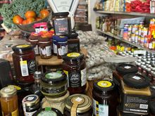 Interior of LA TIENDA DE LOURDES, where I received an education in foods of Lanzarote including cheeses and spirits, including the ubiquitous island tipple, Ron Miel (!!!).   Wonderful shop....so many workers and patrons trying to help me learn more about local foods!    In the town of SOO, near Famara.