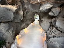 Entrance to another hallway inside house.