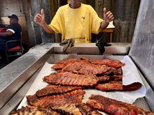 Tour of the pit. Look at those delicious ribs!