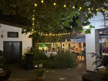 Dining on the patio at Krud Brasserie in Iasi, our first night in Romania