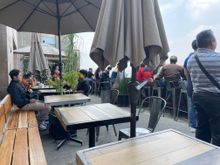 This is at the top of the Sears building and this is so civilized.  There are tables and then there are the chairs on the ledge on the right.  When are first seated they tell you will be at the table for half an hour, you order, get your food and as the ledge seats open up we move you from your table to the ledge.  Everyone gets a chance at the ledge. It's like socialism or something.