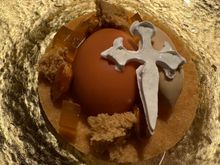 The penultimate course--a deconstructed tarta de Santiago. Even the white cross was edible!!   The "egg," cracked open to reveal a rich custard...this was almost too beautiful to eat, but demolish it we did....  There was one last course--a trio of chocolate "in homage to Ecuador," the native land of one of the two married  chefs; the grandfather of male chef Axel Smyth, came from Ireland, hence his non-Gallego surname.