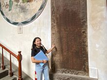 Sushin in front of an old tablet 