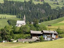 the Santa Maddalena Church is in the background 