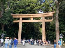 The large Torii gate, one of the two entrances to the Meiji shrine. The torii marks the divide between sacred space and the profane. 