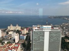 The malecon and National hotel in the background and the Habana Libre hotel in the foreground. 
