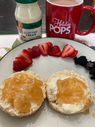 Scones with peach jam and clotted cream