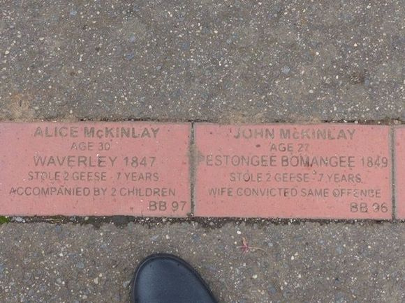 The convict trail, paving stones with personal details along the street