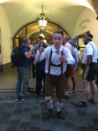 Munich, Germany entrance to the Hofbrauhaus (beer hall). He was coming to grab me and spin me so he was in mid step. 