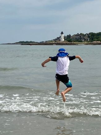 low tide at Wingaersheek beach with Annisquam Lighthouse in the background 