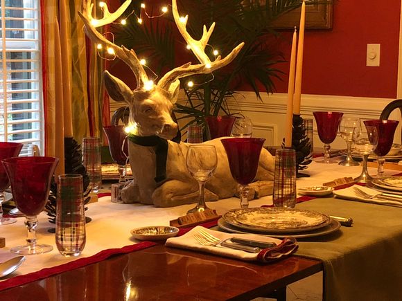 
Deer centerpiece instead of flowers., above.  Below, pewter chargers, flatware and wine glasses with pewter stems are used in this setting.   We have pewter goblets also but they make the table look too masculine IMO. 

