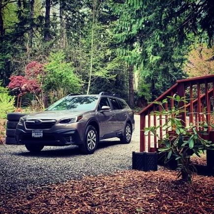 My sons new car. Not a car ad. Their driveway. I think it should be a car ad. I will fit right in there in my new hoodie. 