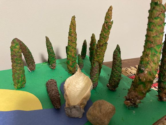 Forest and canoe (milkweed pod)