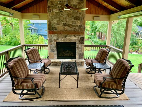 Stereo speakers are on the headers on both sides of the fireplace. Two of the four radiant heaters are on the other headers.
