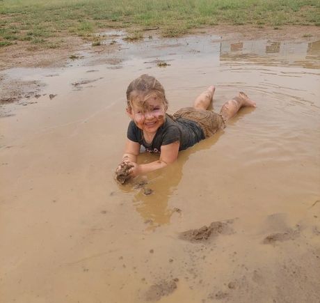This youngster is on a Station out of Longreach.  They had 83mm 
(about 3 1/2 inches) of rain over the weekend.

Happiness is a little kid playing in the mud!