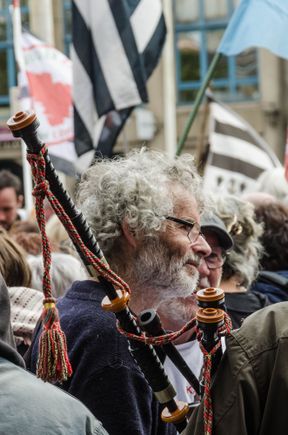 Quimper was even more busy the following weekend. Saturday was the final day of September and saw a major demonstration by 'Kaerez Resistance'. Huge crowds were protesting a partial closure of the regional hospital in Carhaix. Cops were everywhere. As were the media. Buses were re-routed and streets were blocked by authorities. Note the traditional B&W Breton flags behind the protestor musician above.