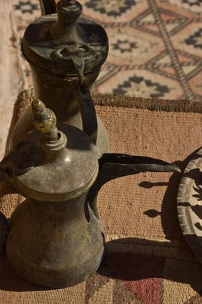 Wild sage ('sheih') is not only made into a 'zaaki' delicious tea, but is also prized for making indigo blue dye. Breakfast ('fatour') by assistant Abdi, also included labanah yogurt with flat pita bread and date syrup. Dinner: 'maglouba'-style chicken. Abdi wore a stylish black Calvin Klein hat. *Nial also presented us with a bottle of fine red local 'St. George wine, similar in taste to that from nearby Bakka valley. He did so 'because otherwise guests will assume that we are not civilized.'