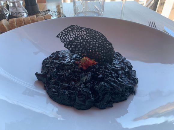 One of the national dishes of Croatia,  Risotto Nero, made with cuttlefish and cuttlefish ink.  This tasted much better than it photographed.  Restaurant Divino.  Hvar Town.