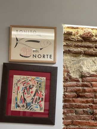 A few of the cornucopia of interesting drawings and photos embellishing the walls