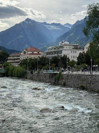 The Passer River and mountains in the background