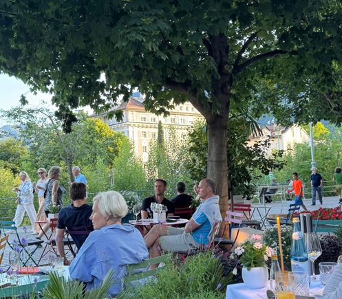 Outdoor dining area at the Aurora Hotel in Merano