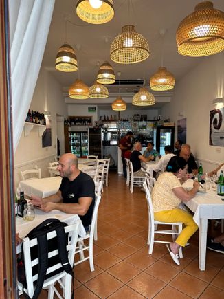 Interior of Ristorante Scala...we ate on the terrace which they told us would be cooler; it was fine but temps are in the 90sF
