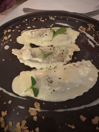 Hit of the evening.....ravioli filled with beef and bathed in a butter and sage sauce.......outstanding!   I tried, but failed, to snag a whole ravioli for myself but I did get a nice taste..and wanted much more!!!!!   This pasta, and the one the following night, at Mamma Iabica, ranked among the best pastas of the three-week stay in Sicily.  20 euro