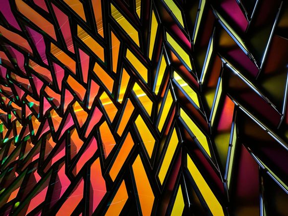 The panes of light change color when you walk to and from inside the tunnel; it's captivating