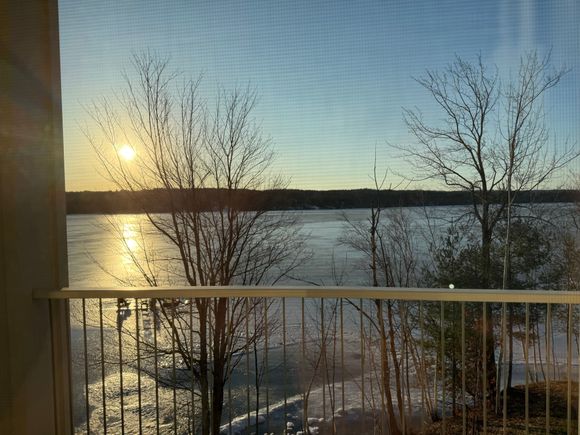 Sunrise from our window. The lake was beginning to melt. 