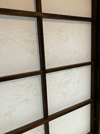 Love the graceful frond design in the rice paper door