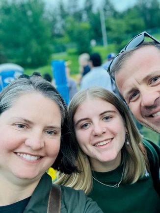 In the line for beers. 