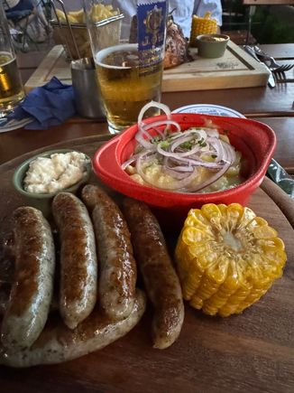 I loved my dish of sausages, potato salad and corn